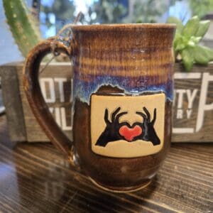 #634 Two hands with heart